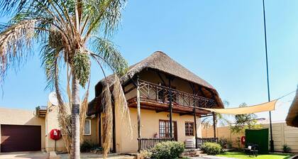 Entire home with thatched loft office & pool
