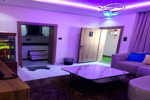 Deluxe Double Room, Balcony, City View | Living area - Dual Hotel and Apartments Limited (Oshodi)