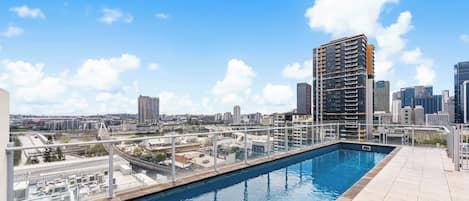 Stunning rooftop pool with views out over Brisbane's CBD