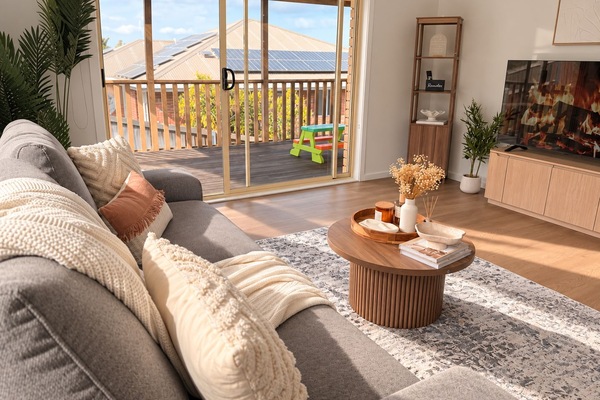 Bright and comfortable living room in our family-friendly Claremont accommodation near Hobart.