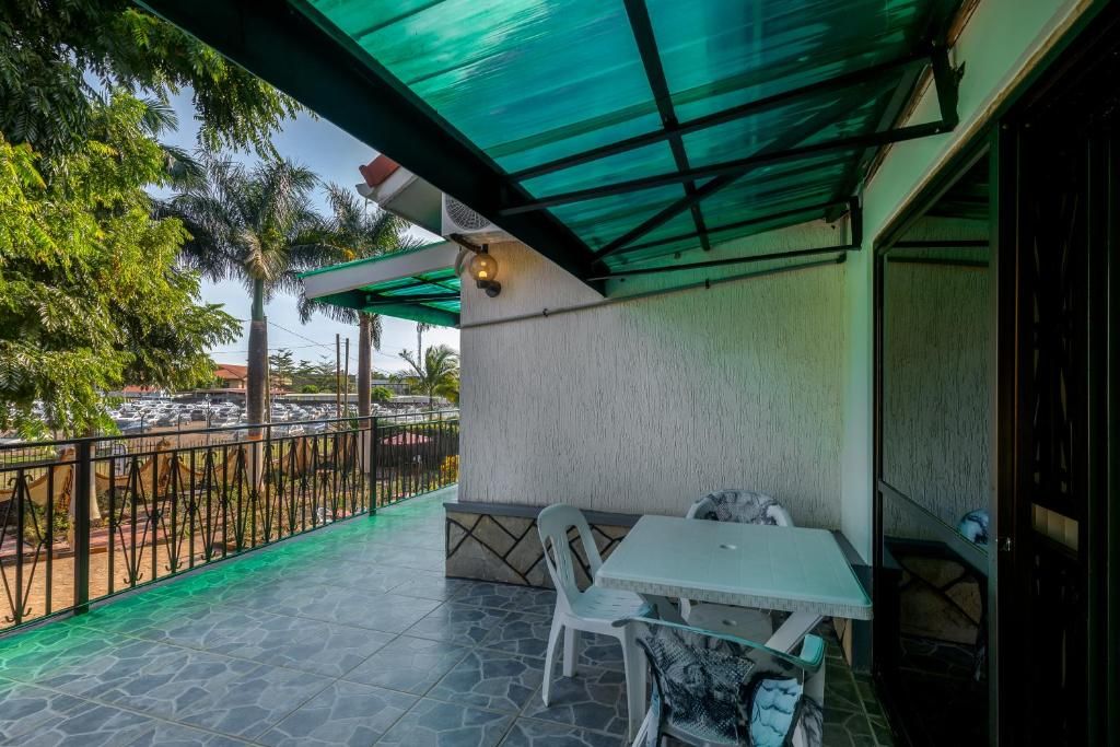 Twin Room, Balcony, Garden View | Outdoor dining