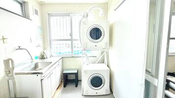 Double Room | Bathroom | Combined shower/tub, hair dryer, towels, soap