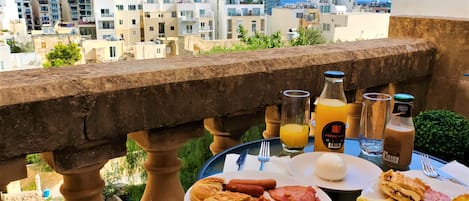 Apartment, Balcony, Sea View | Outdoor dining