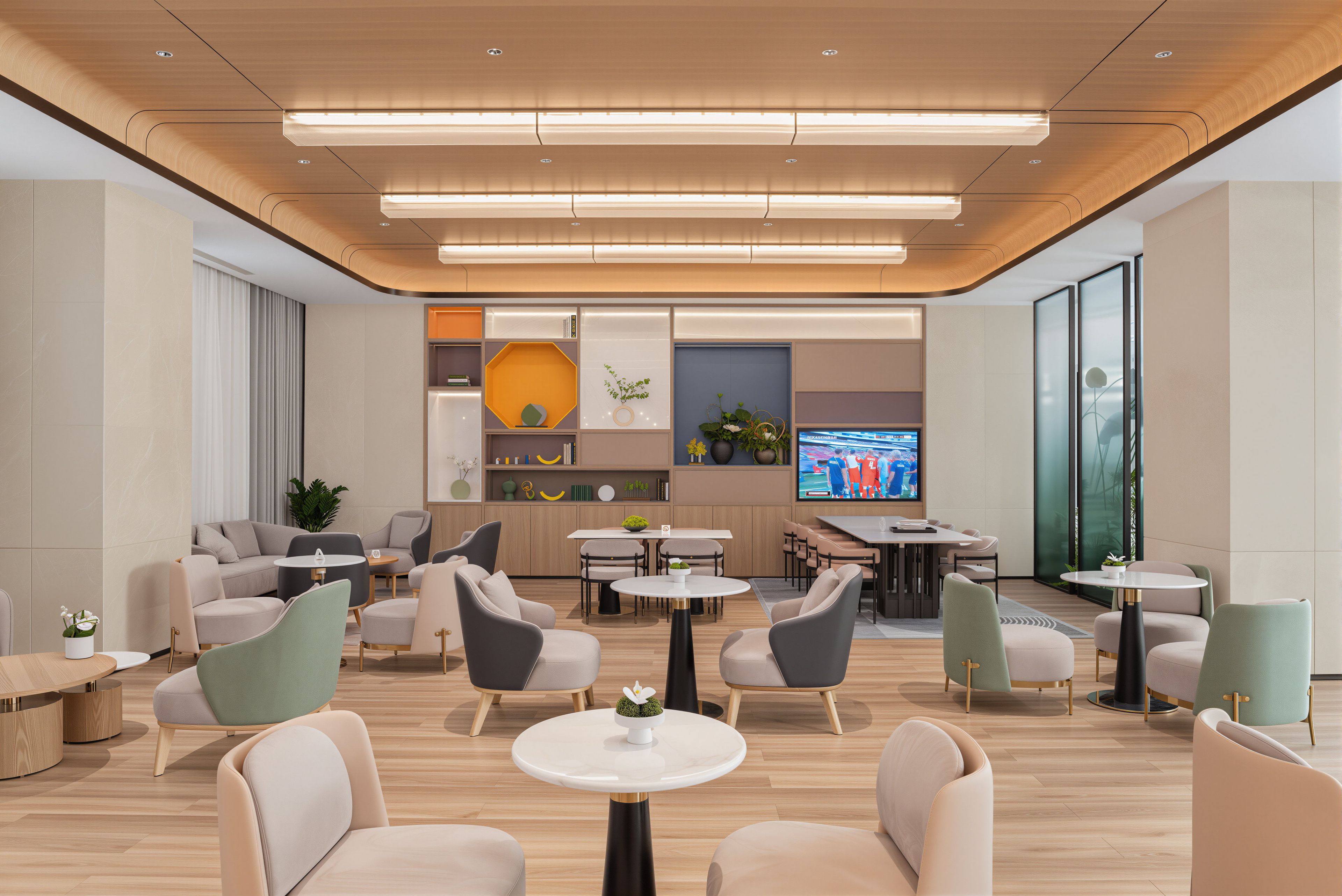 Ein moderner Lounge-Bereich mit Sofas, Tischen und einem Fernsehbildschirm.