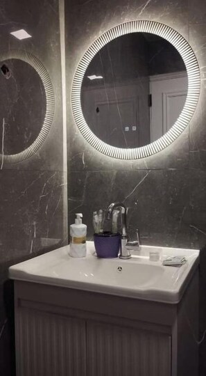 Shower, hair dryer, towels, soap - Frame at the Fair (Qusar)
