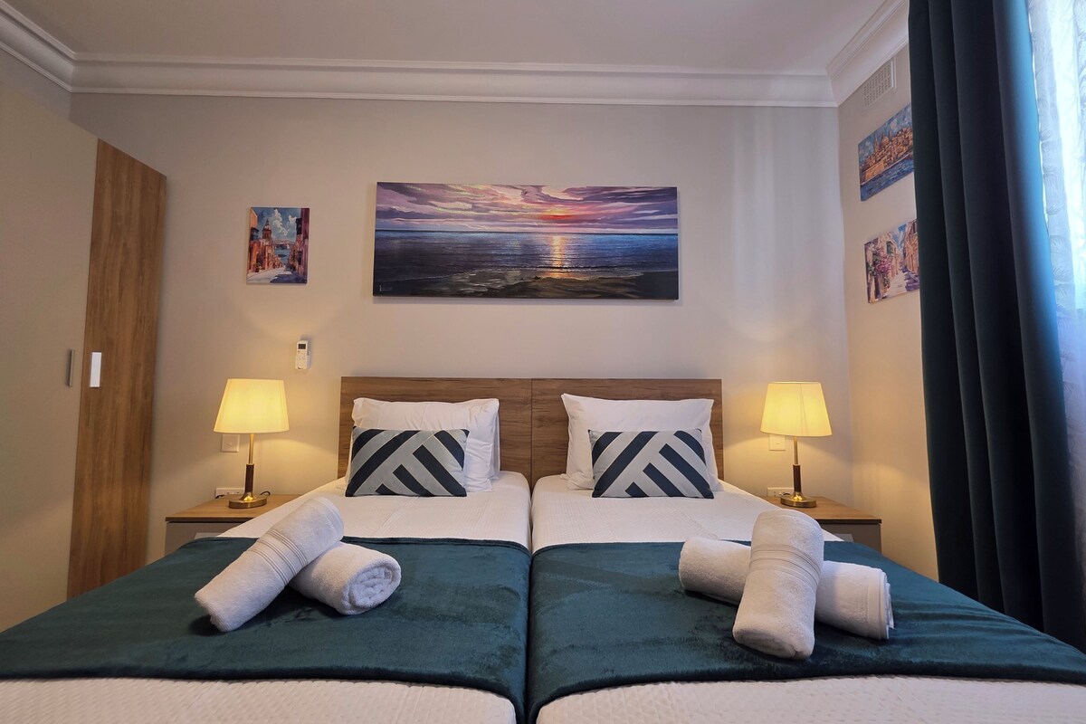 Departamento, vista a la ciudad | Cortinas blackout, tabla de planchar con plancha y wifi gratis 