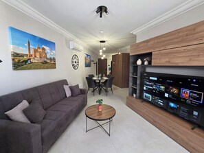 Departamento, vista a la ciudad | Área de sala de estar