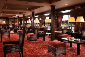 A hotel lobby with multiple seating areas, including sofas and chairs, arranged around tables. - JAZ Crown Jubilee Nile Cruise - Thursday VIA Luxor 7 & 4nts - Monday VIA Aswan 3nts (Luxor)
