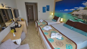 A hotel room with a bed, a desk, a chair, a television, and a painting of a beach scene. - Izgrev Hotel (Struga)