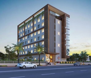 A multi-story hotel with a modern design, featuring a prominent 'GINGER' sign on the facade. - Ginger Nagpur City Centre (Nagpur)