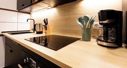 Business & Life Apartment near TU, HBF, and the Opera House — Smart TV and kitchen