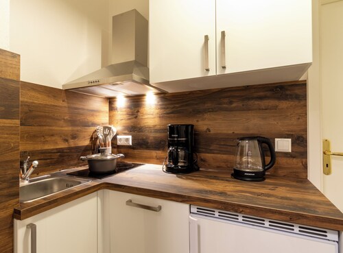 A stunning gem with stucco ceilings! 2 bedrooms, PARKING SPACE right outside the door, close to the main train station