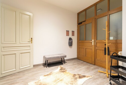 A stunning gem with stucco ceilings! 2 bedrooms, PARKING SPACE right outside the door, close to the main train station