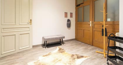 A stunning gem with stucco ceilings! 2 bedrooms, PARKING SPACE right outside the door, close to the main train station