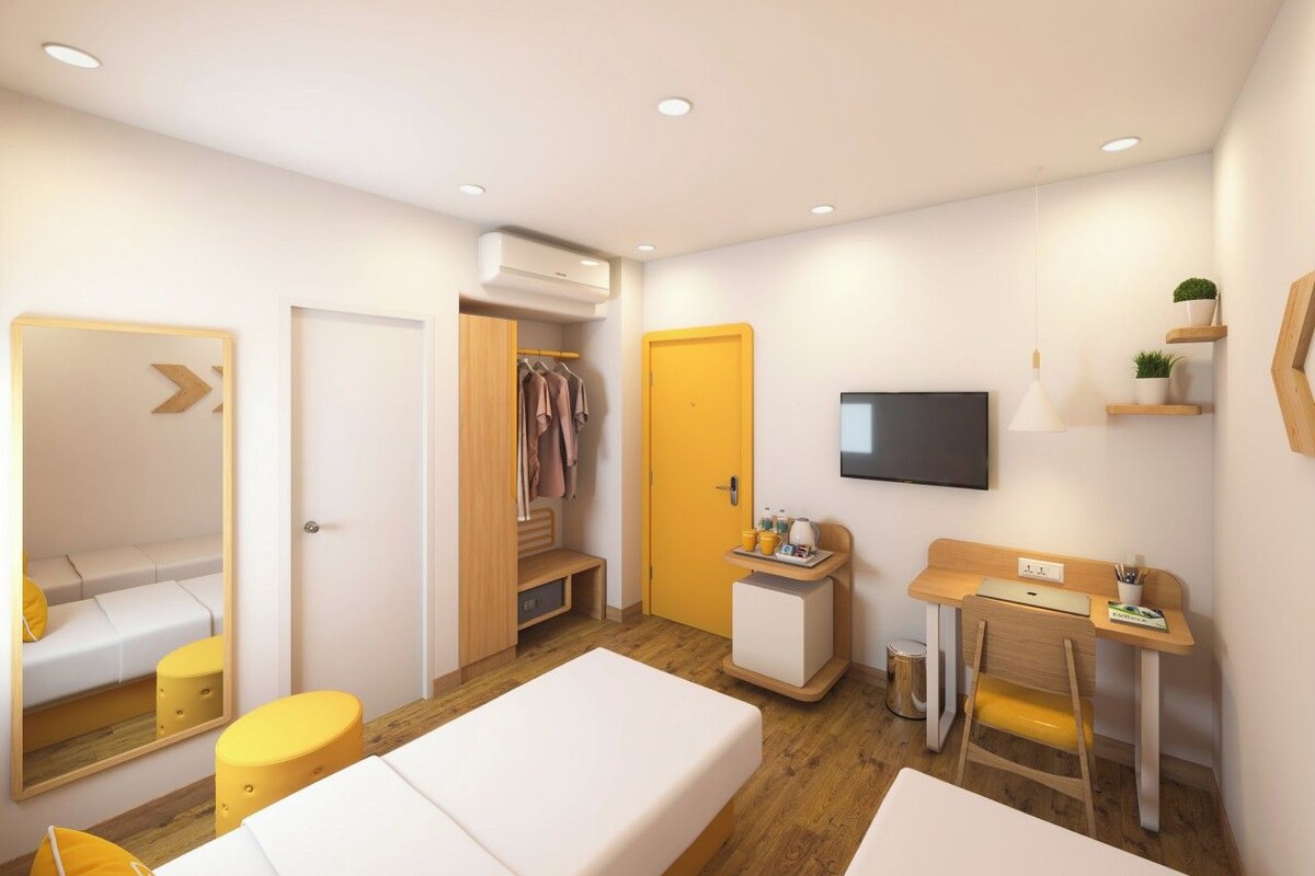 Habitación Deluxe con 2 camas individuales, vistas a la ciudad | Caja fuerte, escritorio, espacio para trabajar con un portátil