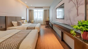 A hotel room with two beds, a desk, a chair, a large window, and a painting on the wall. - Gem Hefei Qianshan North Road Phoenix Hotel (Hefei)
