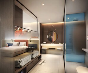A modern hotel room with a bed, bedside table, and a large mirror.