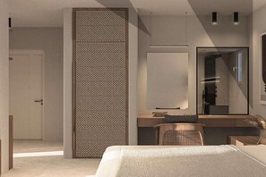 Een moderne slaapkamer met een bed, een bureau en een stoel. Er hangt een grote spiegel aan de muur en een deur naar een andere kamer.