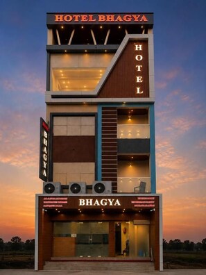 A modern hotel with a prominent sign reading 'HOTEL BHAGYA' and a visible entrance. - Hotel Bhagya (Bhopal)