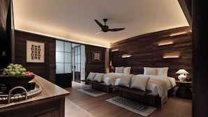 A modern bedroom with a large bed, bedside tables, a ceiling fan, and a wooden wall panel. - Xiaoyin Cuiweiyang Resort (Shenzhen)