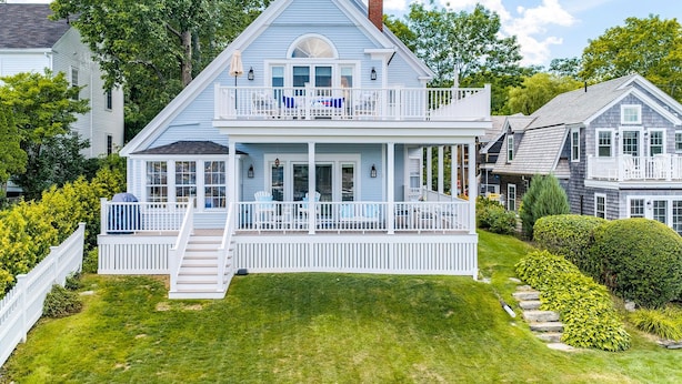 A two-story house with a balcony, a front porch, and a chimney. - Sea Spray
Charming Three Bedroom House with amazing views of Camden Harbor (Camden)