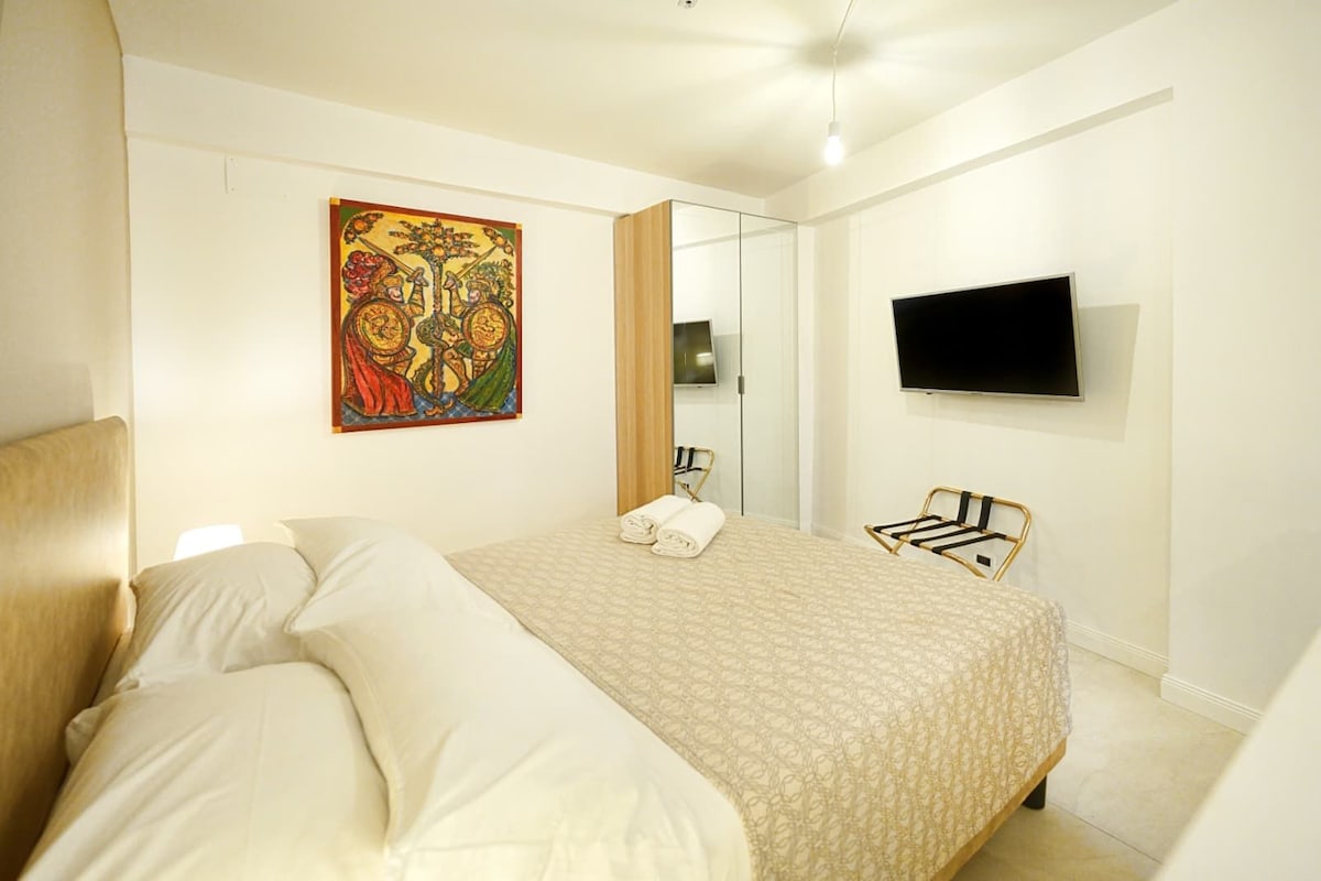 Apartamento família | Cofres nos quartos, escrivaninha, espaço de trabalho para notebook