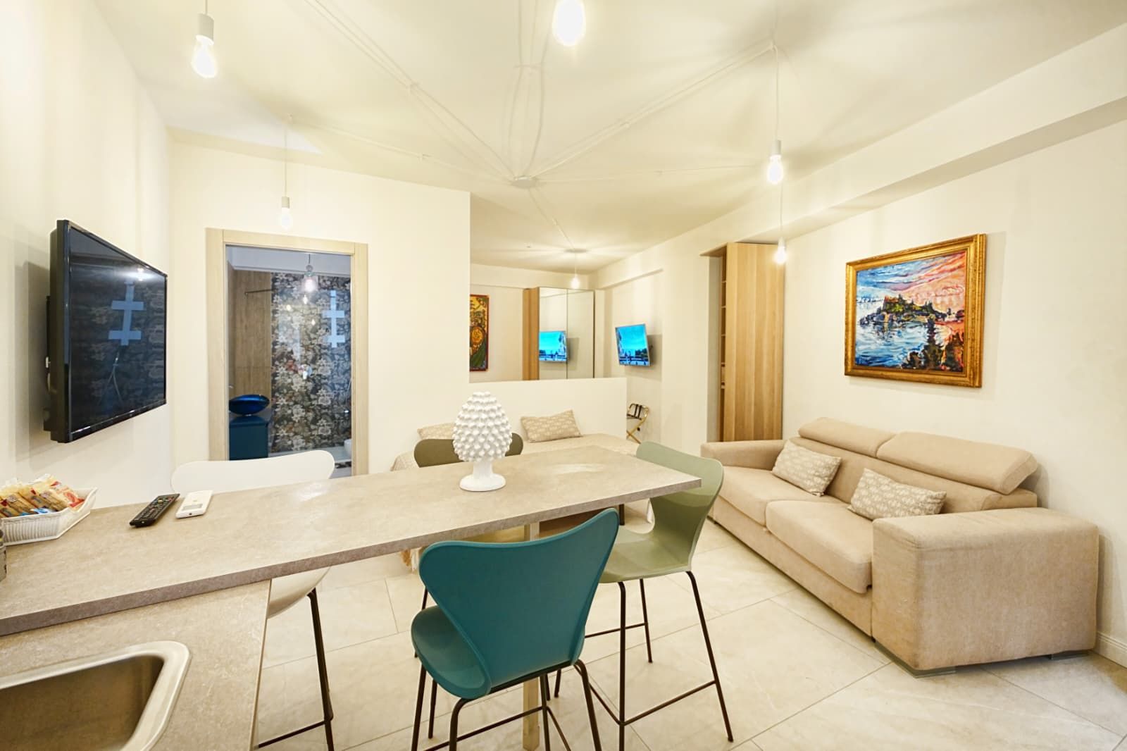 Family Apartment | Living area | 50-inch LED TV with digital channels, printers