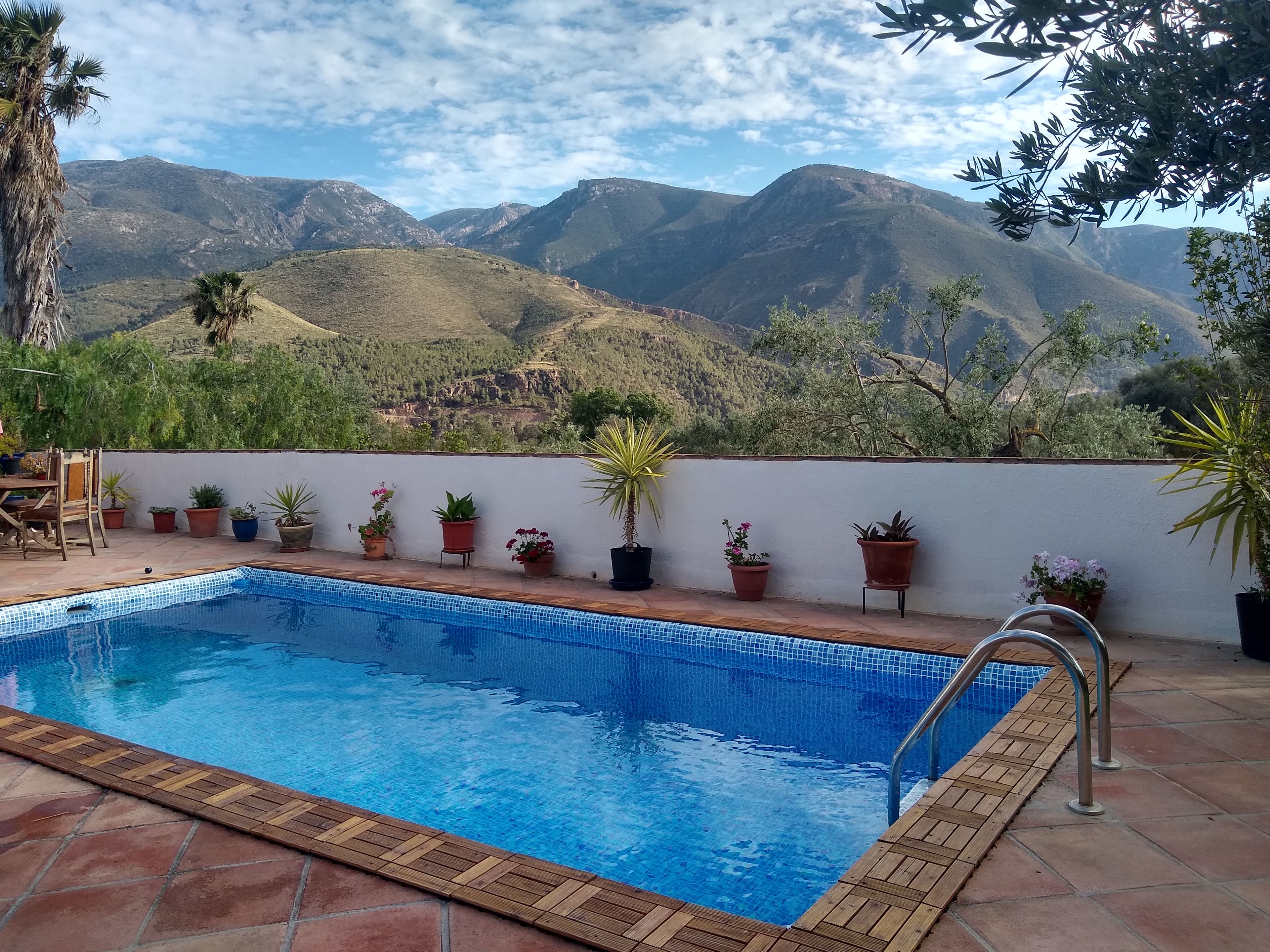 A swimming pool with a view of mountains.