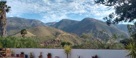 A swimming pool with a view of mountains.