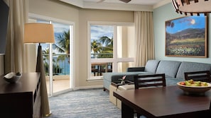 A hotel room with a balcony, a sofa, a dining table, and a painting. - Deluxe Oceanfront 2 Bdrm Lockoff at Westin Kaanapali Ocean Resort Villas South (Lahaina)