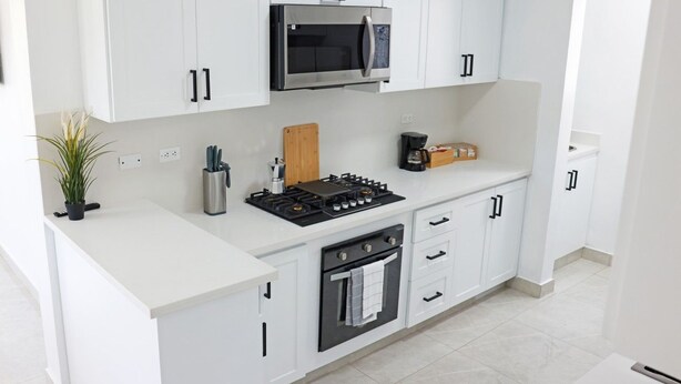 Unclassified image, 1 of 34, button - Serene 2-bedroom apartment with AC in Santiago de los Caballeros, Fast Wi-Fi (Santiago de los Caballeros)