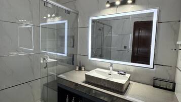 Shower, jetted tub, hair dryer, bidet