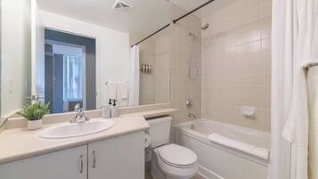 Shower, hair dryer, shampoo