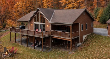 Hillside chalet that sleeps 9 with hot tub, fireplace and gorgeous views!
