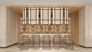Un espace bar moderne avec un comptoir en bois et de nombreux types de sièges.