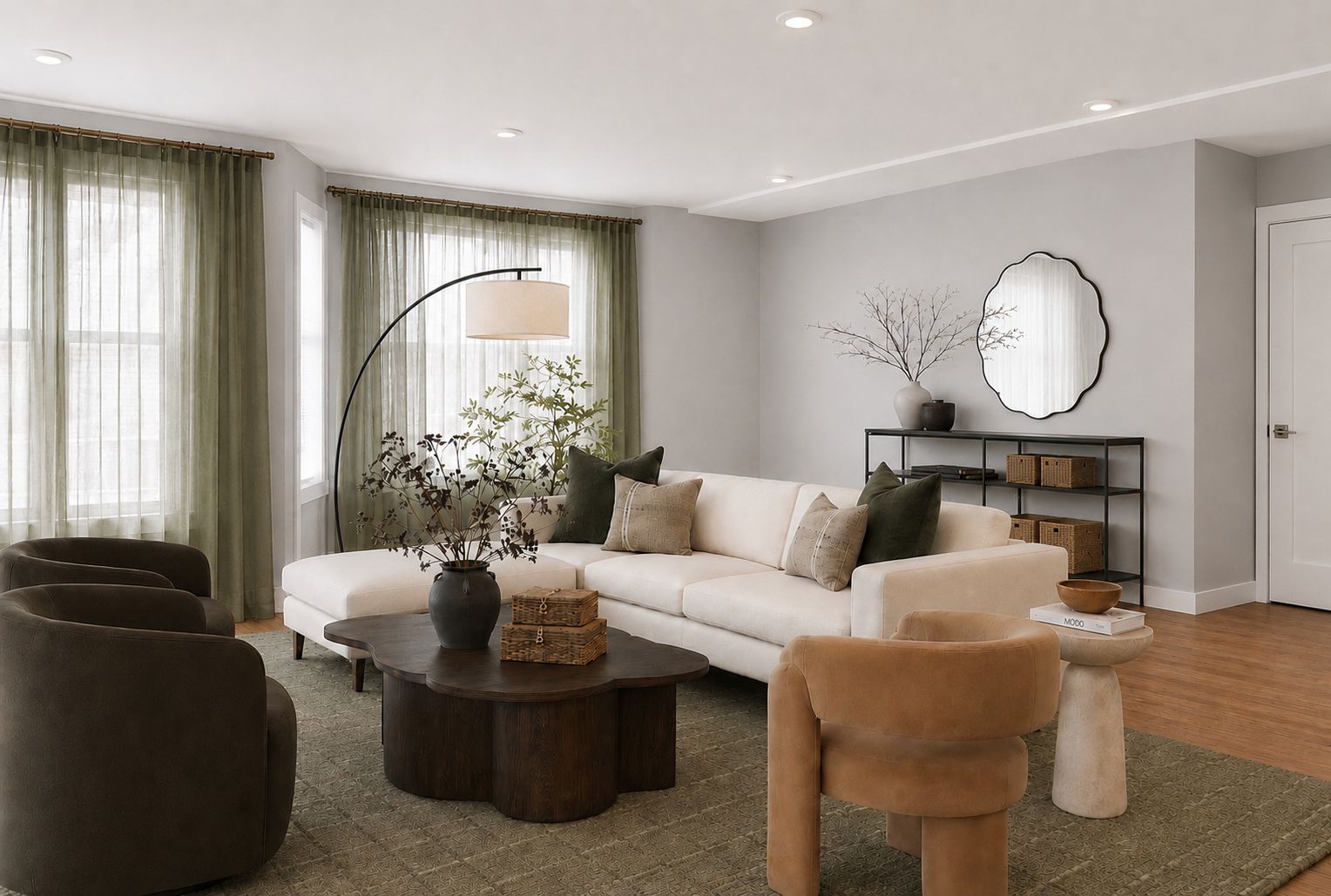 Una sala de estar moderna con un sofá, sillones, una mesita de centro y una lámpara de pie.