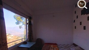 Unclassified image, 4 of 6, button - The Himalayan Kitchen - Cafe & Rooms (Kumharsain)