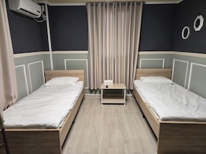 Chambre avec lits jumeaux | Wi-Fi gratuit