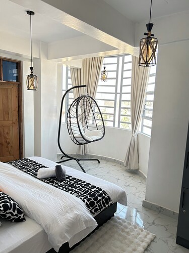 1 BR:Bedroom Swing with a View, Rooftop Kilimanjaro view & Shared Hangout space