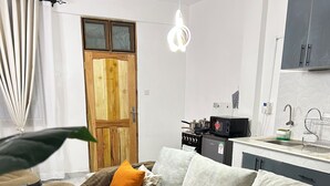 Living area - 1BR:Bedroom Swing with a View, Rooftop Kilimanjaro view & Shared Hangout space (Kajiado County)