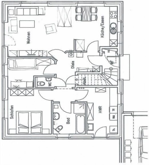 A floor plan of a hotel room with a bed, bathroom, kitchenette, and a small sitting area. - Biesterfeld holiday apartment (Bedekaspeler Marsch  \/ Südbrookmerland)