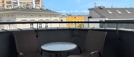 Comfort Apartment, Balcony, Courtyard View | Outdoor dining