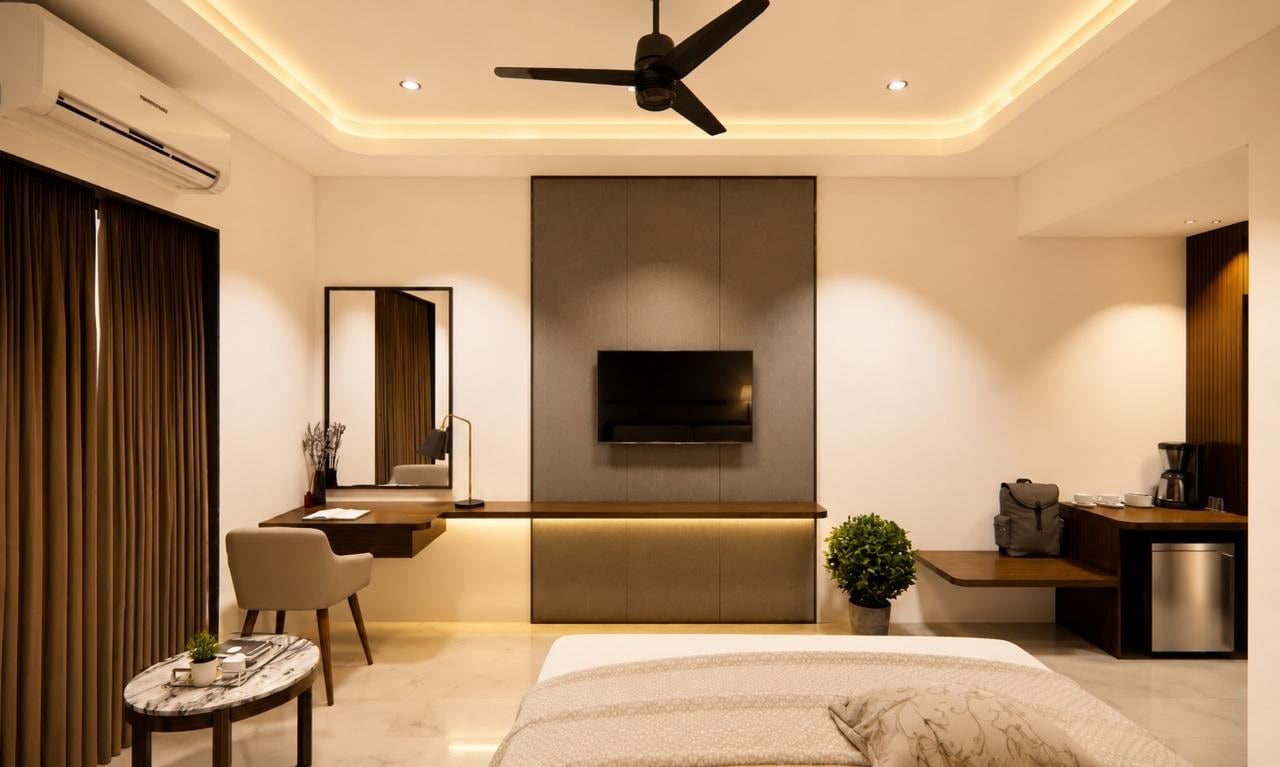 Un dormitorio moderno con cama, escritorio, televisor y kitchenette.