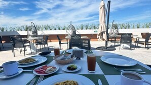 Outdoor dining - Hotel Gafsacomm Tulum Aeropuerto (Mérida)