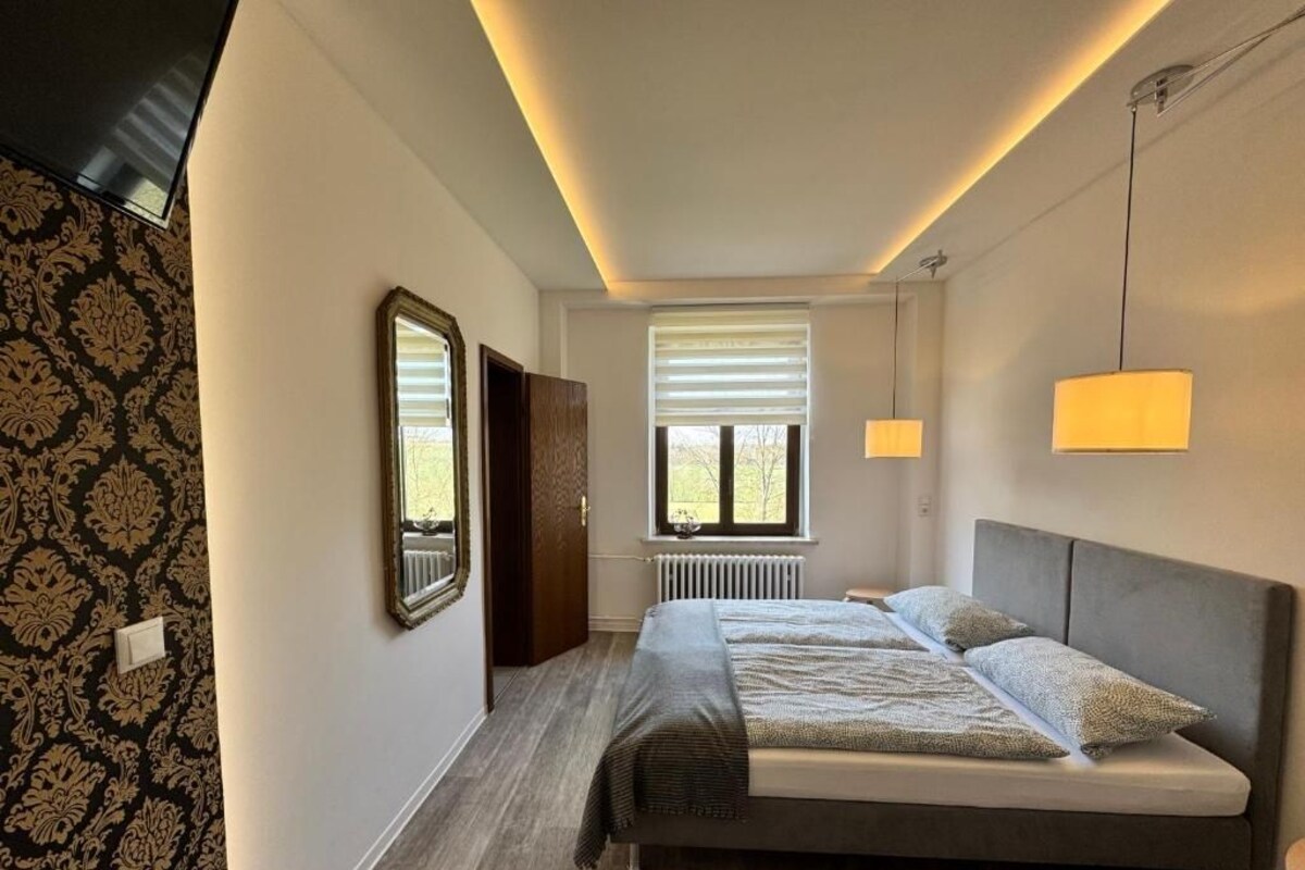 Quarto casal superior, vista para o jardim | Ferros/tábuas de passar roupa, Wi-Fi de cortesia