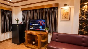 Quarto casal luxo, sacada | Área de estar