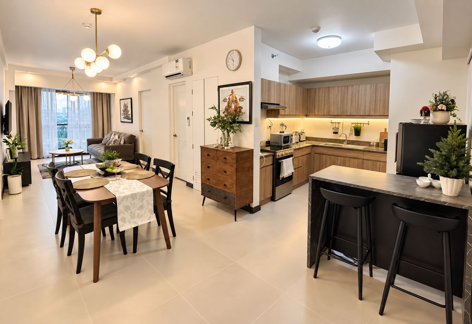 A modern kitchen with wooden cabinets, a built-in oven, and a dining area with a table set for four.