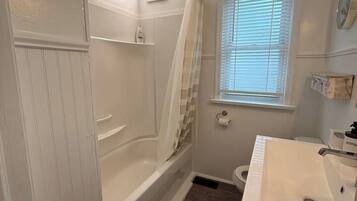 Hair dryer, towels, soap, shampoo