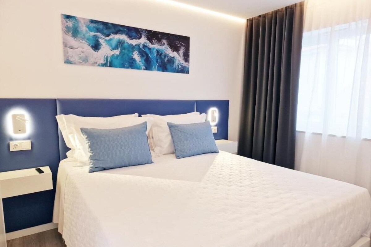 Quarto casal conforto, sacada, vista para a cidade | Wi-Fi de cortesia