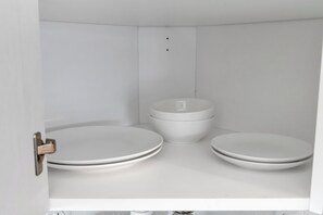 A modern, white bathroom with a toilet and bidet. - Cozy Suite Near Disney + Universal (Kissimmee)